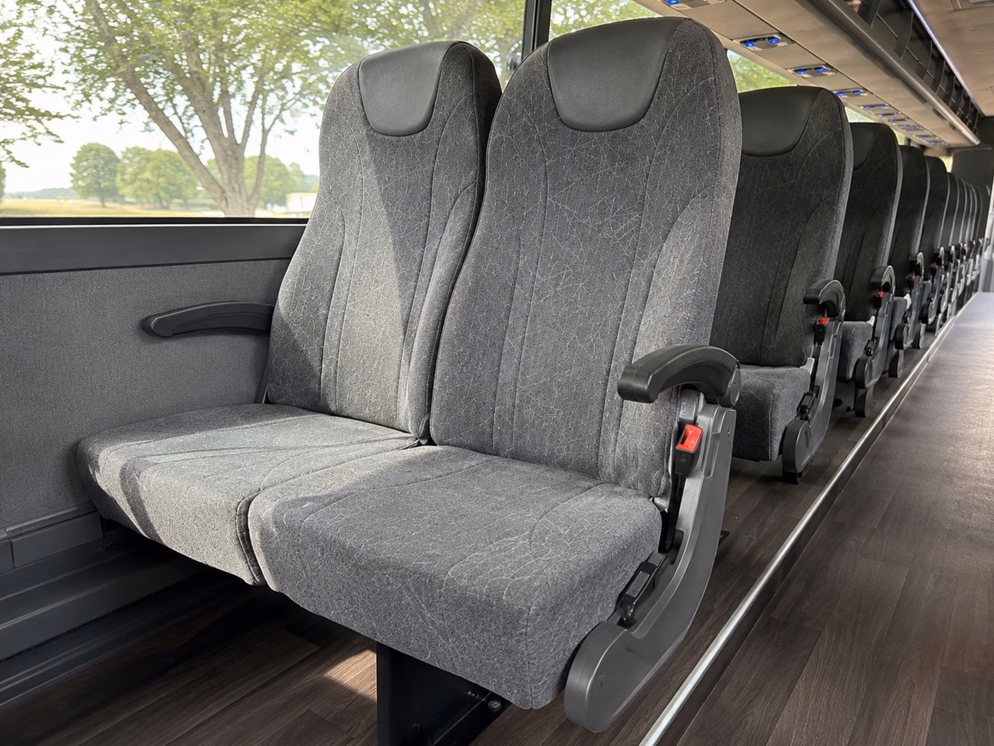 compare charter buses for uw tacoma and pacific lutheran university athletics